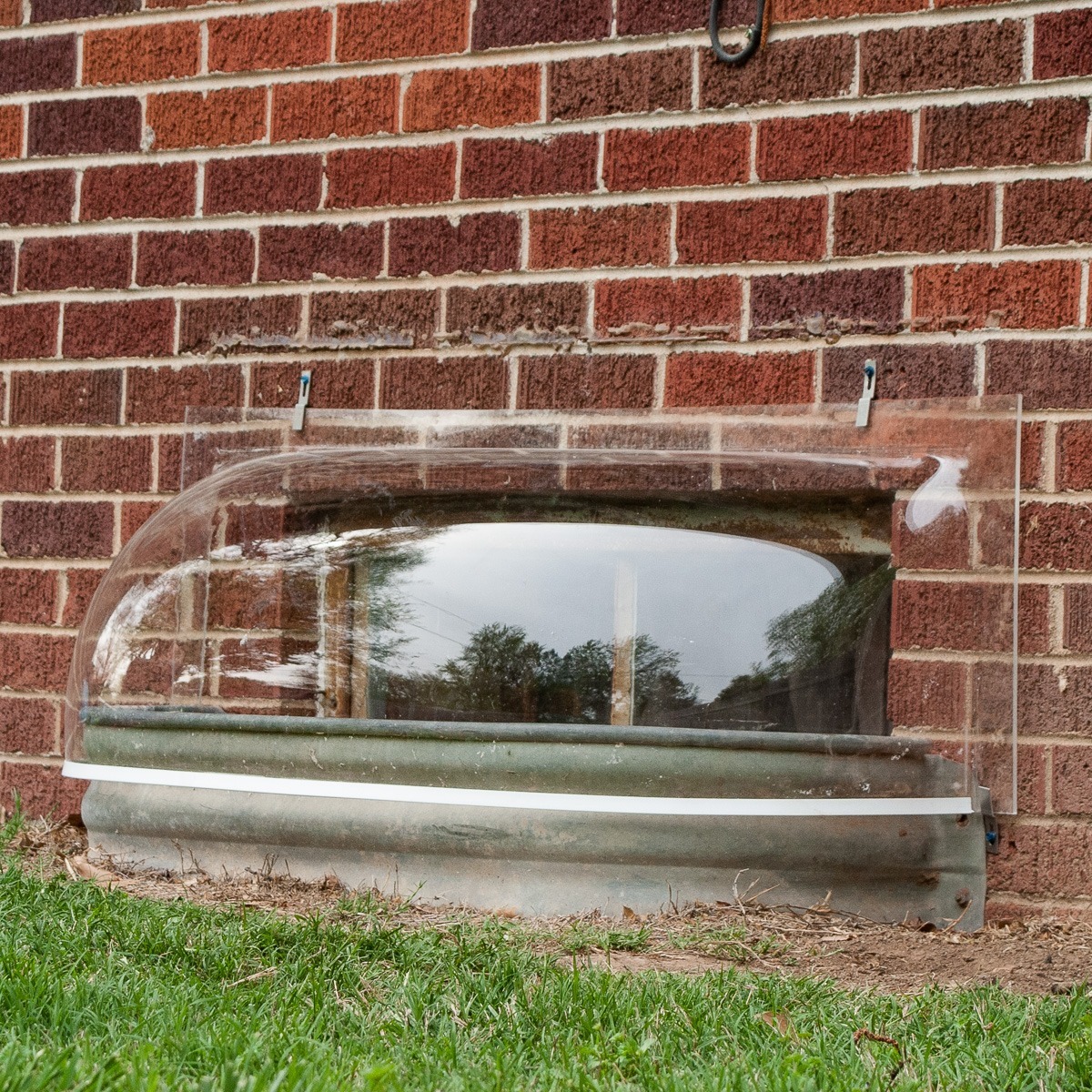 Bubble window well covers by Lustercraft